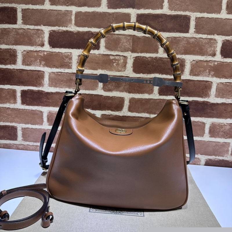G*u*i top handle bags